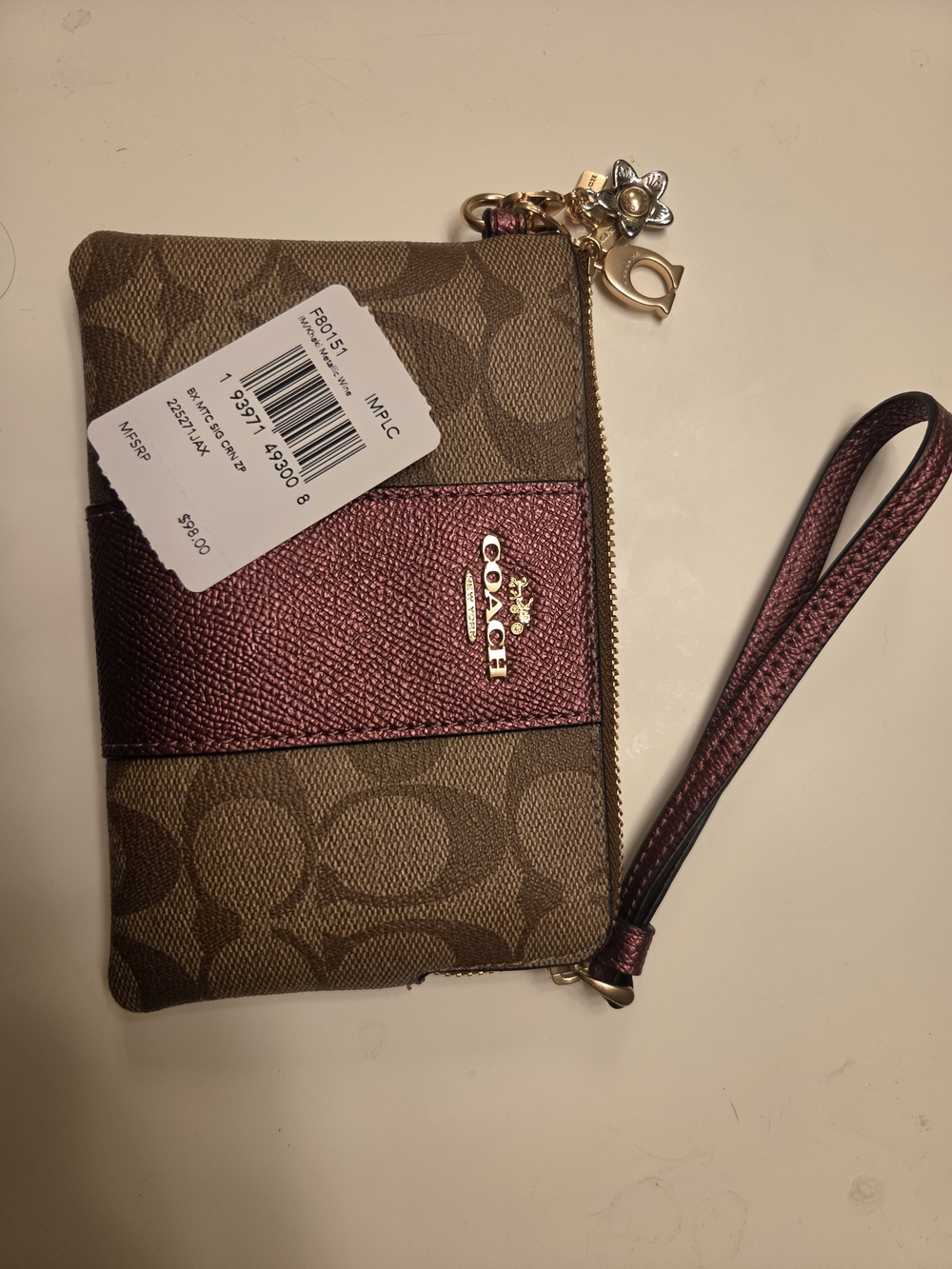 Coach Signature Canvas Wristlet with Metallic Rose Accent